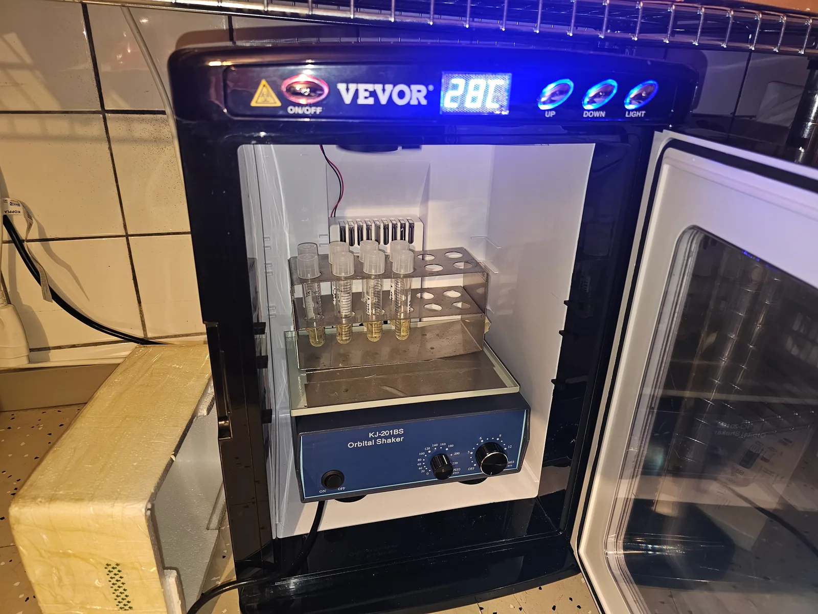 Orbital shaker incubator with culture tubes in Lambda Biolab